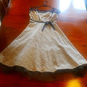 Gorgeous beige and black swing dress